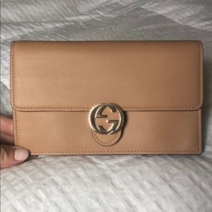Beige Gucci wallet/clutch
